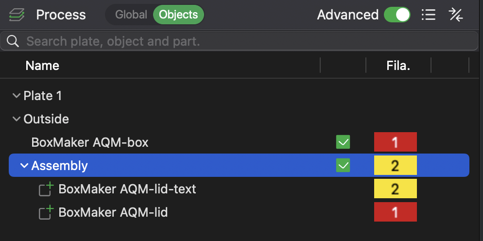 Objects panel after merge — body on filament 1, text on filament 2